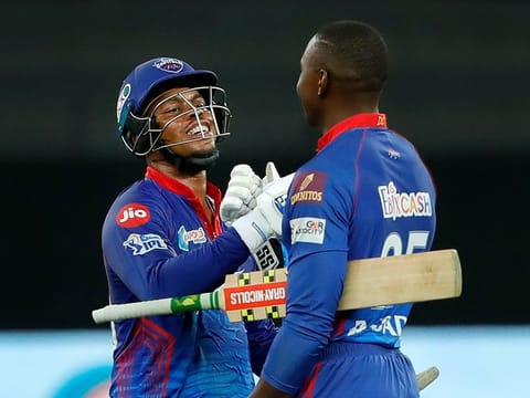 Shimron Hetmyer and Kagiso Rabada celebrate after the Delhi Capitals beat the Chennai Super Kings in the Indian Premier League game at the Dubai International Stadium on October 4, 2021. 