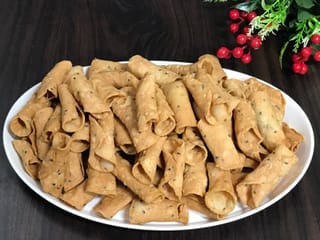 Discover Kuzhalappam or rice flour cannoli, a tea time snack recipe from Kerala