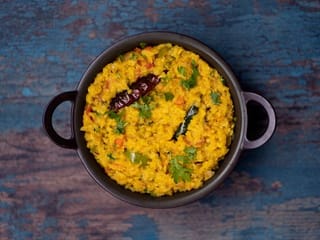 Bhog Khichuri or Bengali-style lentil and rice porridge is the perfect recipe for Durga Puja