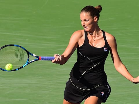 Karolina Pliskova of the Czech Republic hits a forehand return to Beatriz Haddad Maia of Brazil during their third round match at ATP-WTA Indian Wells tennis tournament on October 11, 2021 in Indian Wells, California. 