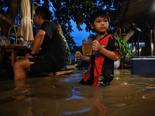 At flooded restaurant near Bangkok, the special is a splash