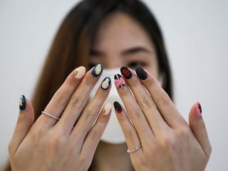 Photos: Malaysian salon paints Squid Games manicures of tiny coffins, green tracksuits 