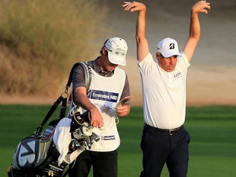 Stephen Deane with Fred Couples at the Dubai Desert Classic