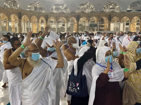 Pilgrims circumambulate around the Kaaba at the Grand Mosque without social distancing for the first time since the beginning of the pandemic in Mecca on October 17, 2021. 