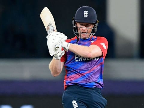 England's captain Eoin Morgan plays a shot during the ICC Men’s Twenty20 World Cup cricket match against the West Indies at the Dubai International Stadium on October 23, 2021.