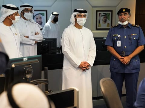 Sheikh Mansoor bin Mohammed bin Rashid Al Maktoum (center front) during his visit to Dubai Customs on Tuesday
