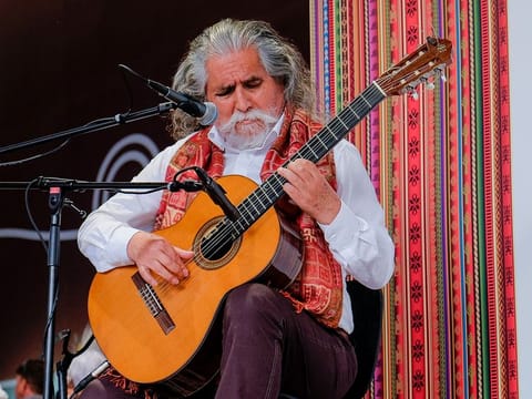 Maestro Manuel Prado regaled visitors with Andean songs in one of the three acts that welcomed guests to the Peru Pavilion