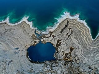 Photos: Aerial view of Dead Sea salt formations and sinkholes