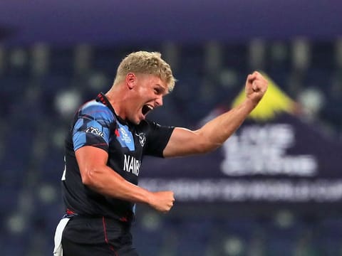 Namibia's Ruben Trumpelmann celebrates the dismissal of Scotland's Richie Berrington in the first over