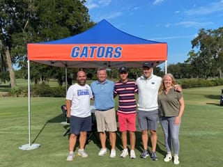 Dubai’s Toby Bishop hits balls next to Henrik Stenson on first visit to University of Florida