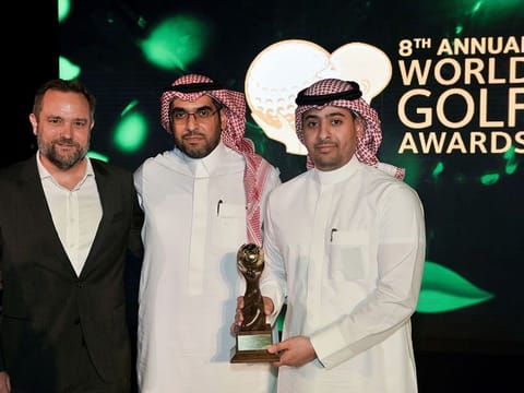 Ed Edwards, Fawaz Al Ayban, Meshari Al Bahli of Golf Saudi collect their World Golf Award