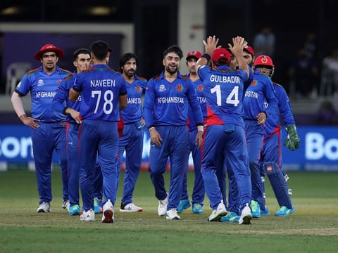 Afghanistan's Rashid Khan (centre) and teammates celebrate the dismissal of Pakistan's Mohammad Hafeez during the Cricket Twenty20 World Cup match in Dubai, UAE. Afghanistan face Namibia next and ought to beat them.