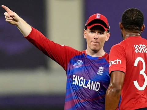 Renaissance Man? : England's white ball captain Eoin Morgan gestures next to his teammate Chris Jordan during their recent campaign in ICC T20 World Cup in the UAE.