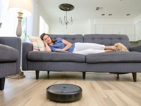 A robot vacuum taking care of cleaning the home (For illustrative purposes only) 