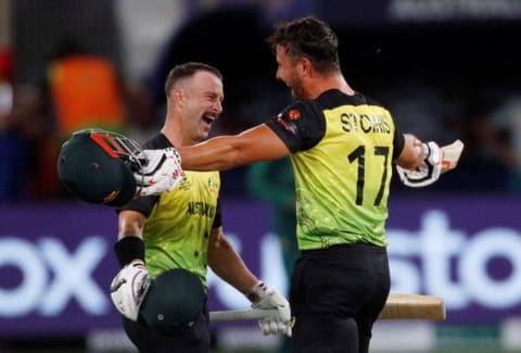 Australia's Matthew Wade (left) and Marcus Stoinis celebrate after beating Pakistan in a thrilling T20 World Cup semifinal at the Dubai International Cricket Stadium, Dubai, UAE.
