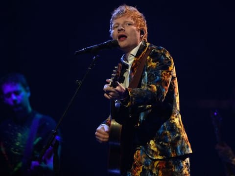 English singer-songwriter Ed Sheeran perforems on stage during the MTV Europe Music Awards at the Laszlo Papp Budapest Sports Arena in Budapest, Hungary on November 14, 2021. 