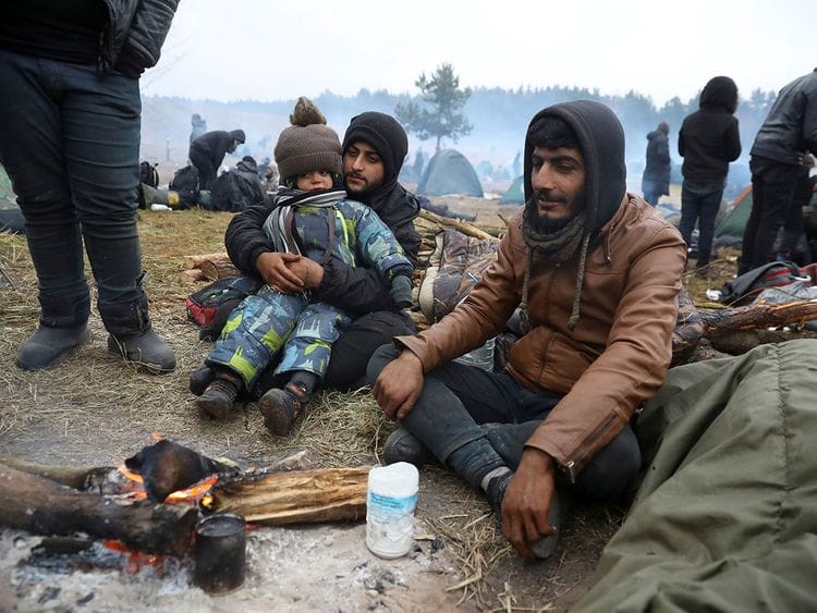 2021-11-18T194850Z_2135624479_RC2UWQ99RIK7_RTRMADP_3_EUROPE-MIGRANTS-BELARUS-POLAND-(Read-Only)