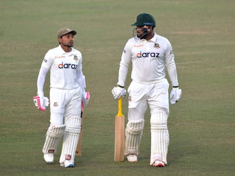 Bangladesh's Mushfiqur Rahim (left) and teammate Yasir Ali walk back after the end of the third day play of the first Test cricket match between Bangladesh and Pakistan at the Zahur Ahmed Chowdhury Stadium in Chittagong.