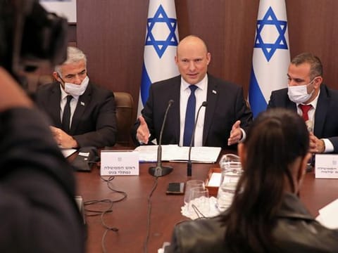 Israeli Prime Minister Naftali Bennett chairs a weekly cabinet meeting in Jerusalem on December 5, 2021.  