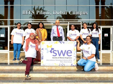 Dr. R. Swarnalatha, Faculty In-Charge (4th from the left) and Prof. Srinivasan Madapusi, Director ,  BITS Pilani, Dubai Campus (5th from the left) with other members of SWE at the campus