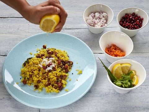 Poha or flattened rice with spices and regional tempering 