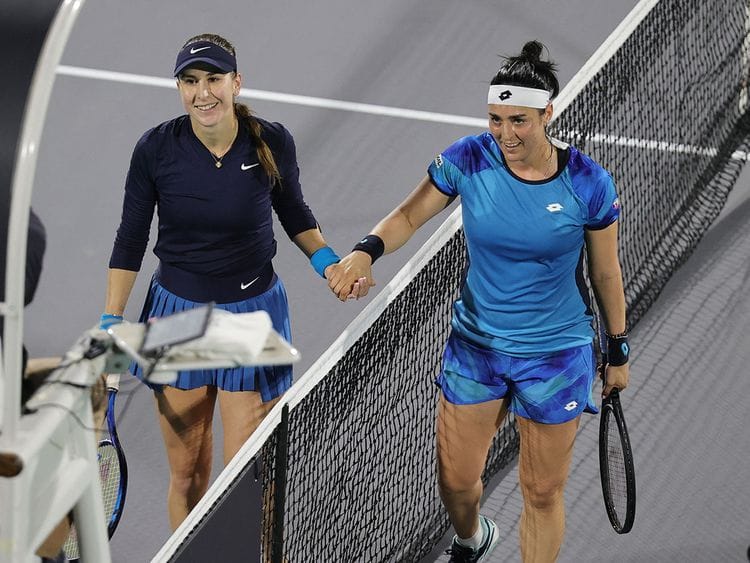 Tunisia's Ons Jabeur shakes hands with Switzerland's Belinda Bencic after their match in Abu Dhabi