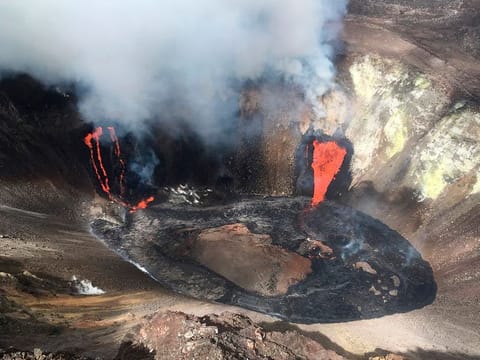 A plume rises near active fissures in the crater of Hawaii's Kilauea volcano on Monday, December 21, 2020. 
