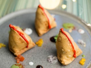 Paneer bhurji or crumbled cottage cheese samosa 