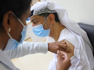 In Pictures: Dubai residents queue up to receive COVID-19 vaccination