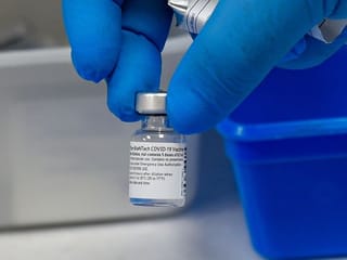 I got vaccinated for COVID-19 but can’t see the status on the AlHosn app
