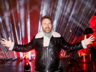Photos: DJ David Guetta records hour-long NYE show in front of Louvre Museum