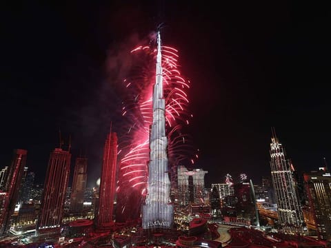 Fireworks explode at the Burj Khalifa, the world's tallest building, during the New Year's Eve celebration in Dubai (2022)