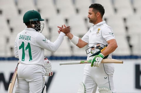 South African skipper Dean Elgar (right) celebrates the victory over India with teammate Temba Bavuma (L) at the Wanderers in Johannesburg on Thursday.