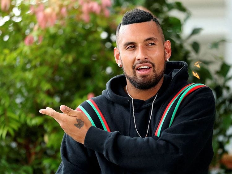 Nick Kyrgios speaks to the media 
