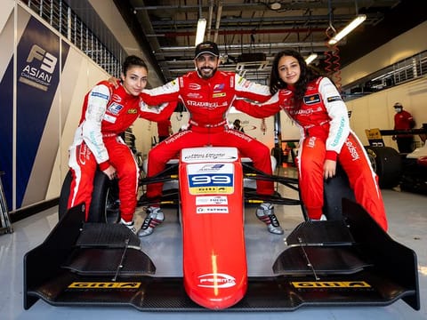 Khaled Al Qubaisi with daughters Amna and Hamda