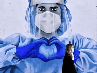 Photos: COVID-inspired murals around the world