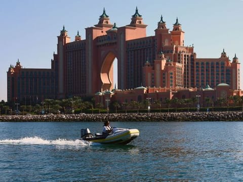 Captain a self-drive boat along the Dubai coastline