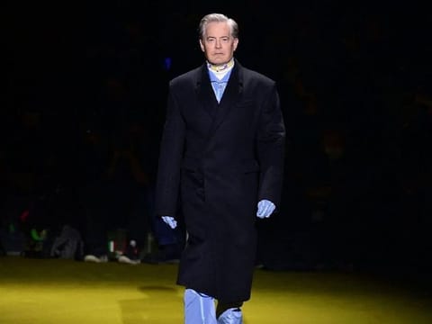 Actor Kyle MacLachlan opened the Prada FW 22 show. 