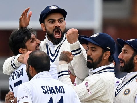 India’s captain Virat Kohli celebrates with Ishant Sharma (left) and other teammates after the successful appeal for the wicket of England’s Jonny Bairstow on the final day of the second cricket Test match at Lord’s in London, on August 16, 2021. Kohli quit as Test captain on January 15, 2022, bringing to an end a controversy-laden seven-year stint in one of the highest-profile, highest-pressure positions in sport. 