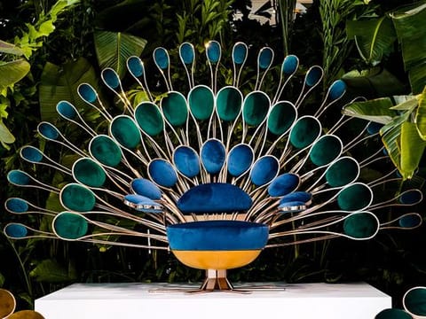 The peacock throne or 'Il Pavone', a statement piece in the collection 'The Garden of Beauty' by Visionnaire Home Philosophy, a meta-luxury home design house.