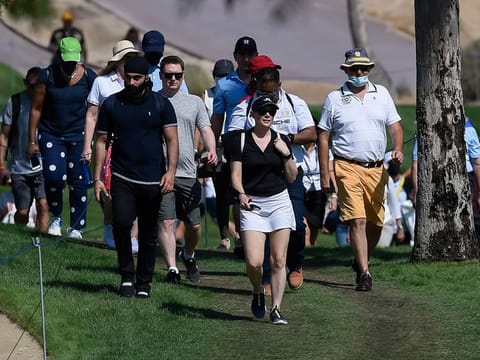 Fans follow the Dubai Desert Classic action