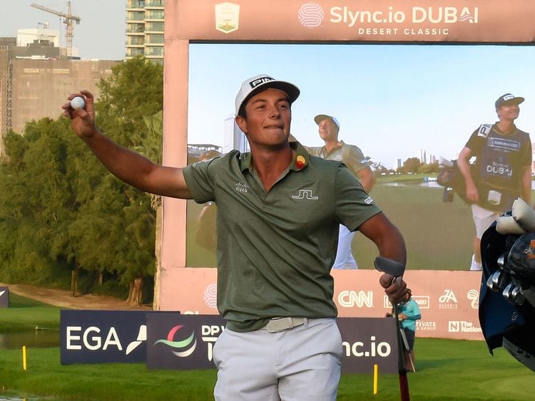 Victor Hovland celebrates his win at the Dubai Desert Classic 