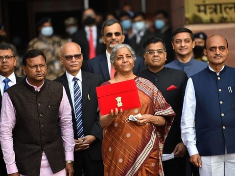 India's Finance Minister Nirmala Sitharaman along with the Ministers of State for Finance Pankaj Chaudhary and Bhagwat Karad. Sitharaman read out the Union Budget 2022-23 in the Parliament today 