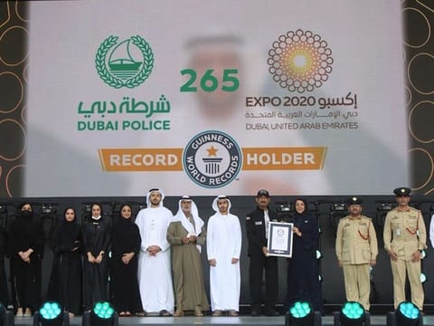  Dubai Police have broken the Guinness World Record for the largest online video chain of people passing the Expo 2020 Dubai Pin.