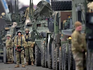 Soldiers of the 2nd Cavalry Regiment line up vehicles at the military airfield in Vilseck, Germany as they prepare for their deployment to Romania in support NATO allies and demonstrate US commitment to NATO Article V. File photo taken on February 9, 2022.