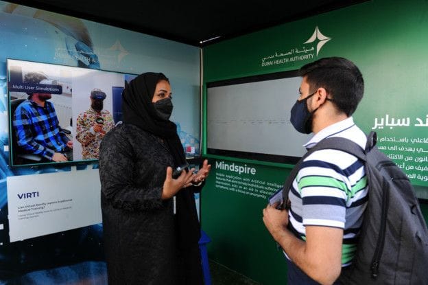 Dr Ayesha Al Basti with a visitor at 'Mindspire' event at Expo-1644841205236