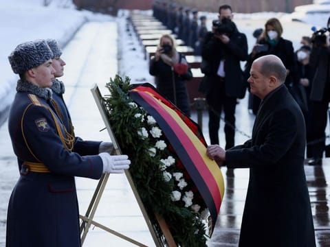 German Chancellor Olaf Scholz takes part in a wreath-laying ceremony at the Tomb of the Unknown Soldier by the Kremlin Wall in Moscow, Russia, on February 15, 2022.  