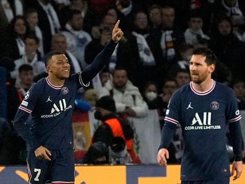 Kylian Mbappe (left) celebrates with teammate Messi after scoring PSG's match-winner against Real Madrid on Tuesday.