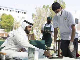 Emirati students of determination serve customers at special Abu Dhabi café