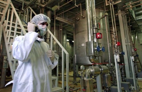An Iranian security officer at a Uranium Conversion Facility just outside the city of Isfahan, Iran.